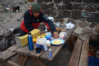 13 Agustin Serving Breakfast At Pampa de Lenas 2862m On The Trek To Aconcagua Plaza Argentina Base Camp.jpg